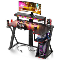 the 42inch black carbon fiber flow vibe gaming desk in the white background