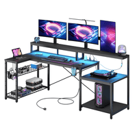 the black 71.5 inch l shaped gaming desk with led lights in the white background